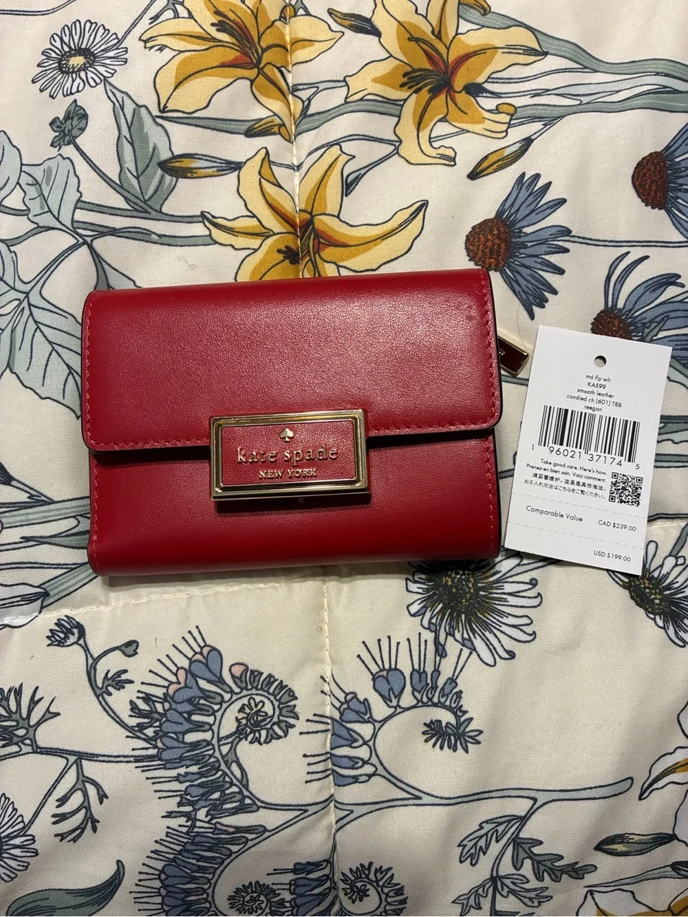 kate spade red leather compact flap wallet with gold plaque